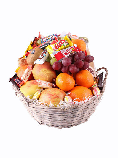 Sweet fruit basket with candy